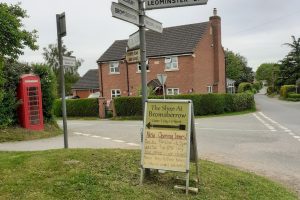 06Signpost and sign to shopresized